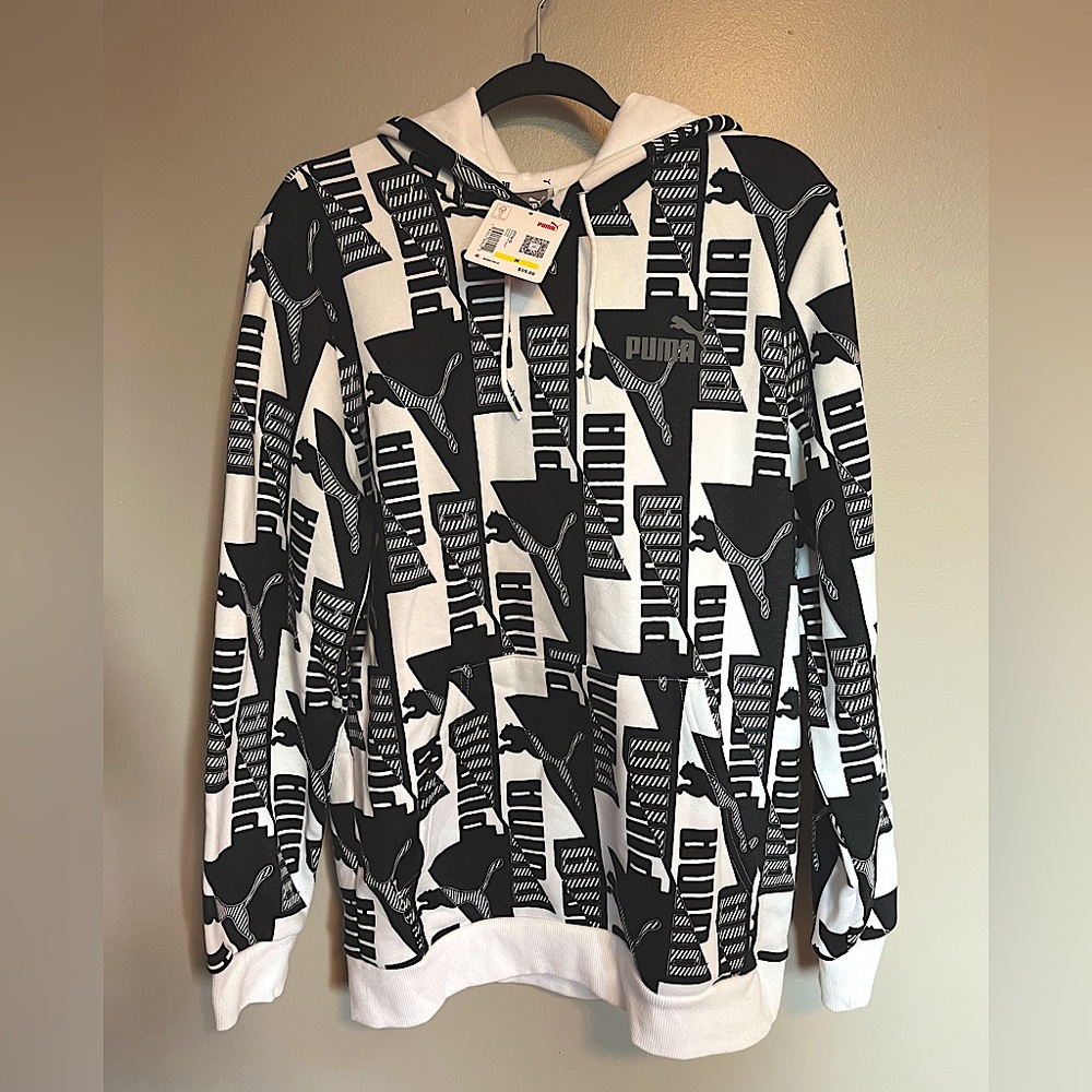 Brand new Puma sweatshirt. Black and white NWT super soft shelled.